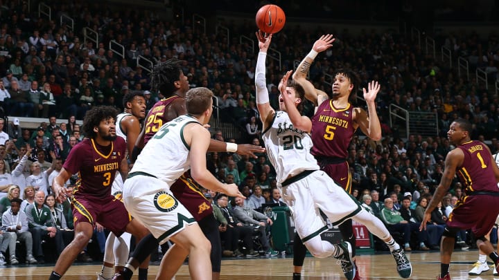 EAST LANSING, MI – FEBRUARY 09: Matt McQuaid #20 of the Michigan State Spartans shoots the ball and draws a foul from Amir Coffey #5 of the Minnesota Golden Gophers in the first half at Breslin Center on February 9, 2019 in East Lansing, Michigan. (Photo by Rey Del Rio/Getty Images)