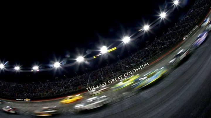 BRISTOL, TN - AUGUST 20: Cars race during the NASCAR Sprint Cup Series Bass Pro Shops NRA Night Race at Bristol Motor Speedway on August 20, 2016 in Bristol, Tennessee. (Photo by Sean Gardner/Getty Images)
