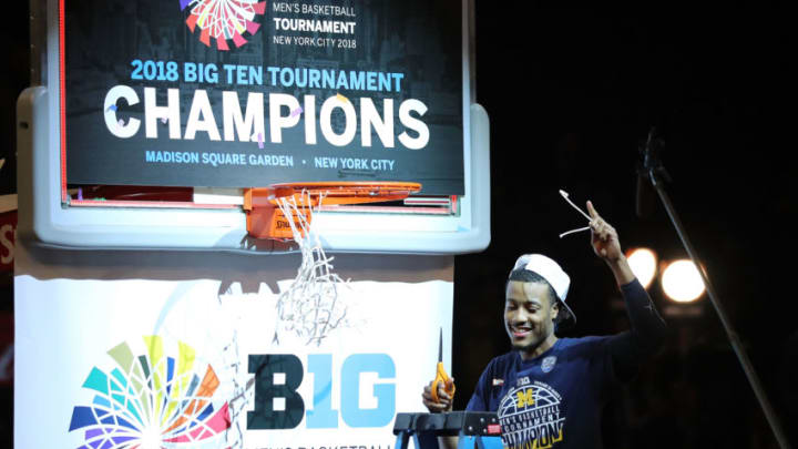 NEW YORK, NY - MARCH 04: Muhammad-Ali Abdur-Rahkman #12 of the Michigan Wolverines celebrates after defeating the Purdue Boilermakers 75-66 during the championship game of the Big 10 Basketball Tournament at Madison Square Garden on March 4, 2018 in New York City. (Photo by Abbie Parr/Getty Images)