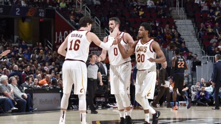 CLEVELAND, OH - FEBRUARY 21: Cedi Osman #16 hi-fives Kevin Love #0 and Brandon Knight #20 of the Cleveland Cavaliers on February 21, 2019 at Quicken Loans Arena in Cleveland, Ohio. NOTE TO USER: User expressly acknowledges and agrees that, by downloading and/or using this Photograph, user is consenting to the terms and conditions of the Getty Images License Agreement. Mandatory Copyright Notice: Copyright 2019 NBAE (Photo by David Liam Kyle/NBAE via Getty Images)
