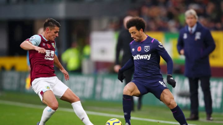 BURNLEY, ENGLAND - NOVEMBER 09: Felipe Anderson of West Ham United is challenged by Ashley Westwood of Burnley during the Premier League match between Burnley FC and West Ham United at Turf Moor on November 09, 2019 in Burnley, United Kingdom. (Photo by Clive Brunskill/Getty Images)