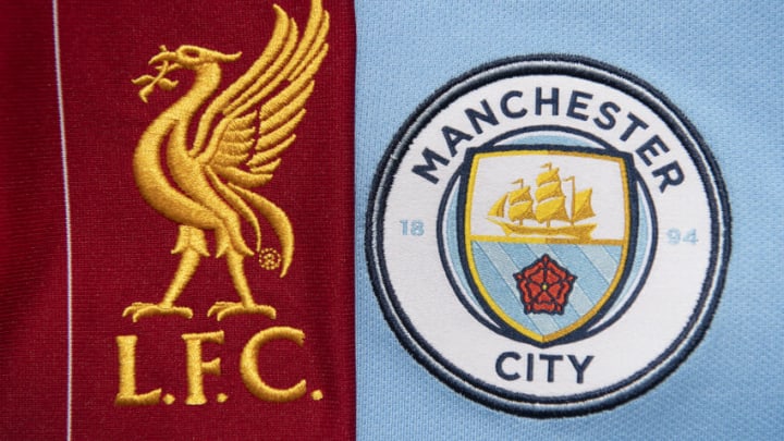 MANCHESTER, ENGLAND - MAY 04: The Liverpool and Manchester City club crests on their first team home shirts on May 4, 2020 in Manchester, England (Photo by Visionhaus)