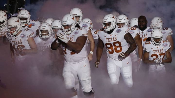 HOUSTON, TX - DECEMBER 27: Texas Longhorns take the field during the Academy Sports & Outdoors Bowl at NRG Stadium on December 27, 2017 in Houston, Texas. (Photo by Bob Levey/Getty Images)