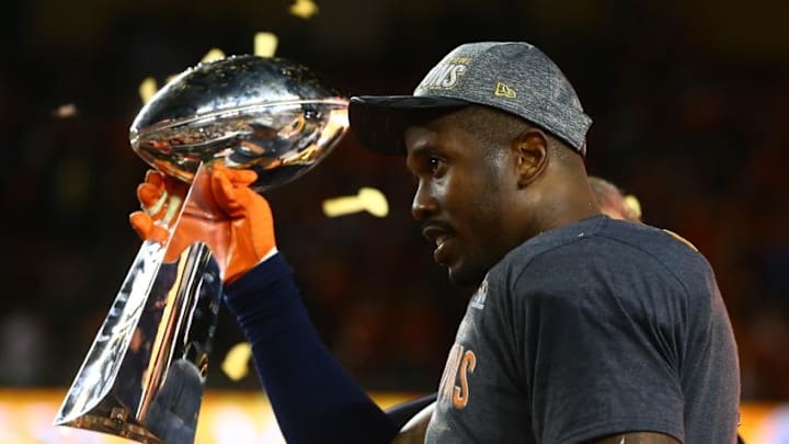 Feb 7, 2016; Santa Clara, CA, USA; Denver Broncos outside linebacker Von Miller (58) holds the Vince Lombardi Trophy after defeating the Carolina Panthers in Super Bowl 50 at Levi