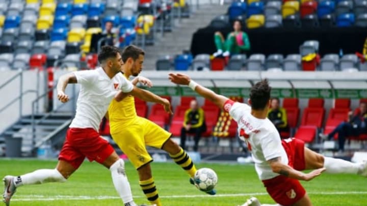 Raphael Guerreiro’s goal was rather harshly ruled out for handball (Photo by LEON KUEGELER/POOL/AFP via Getty Images)