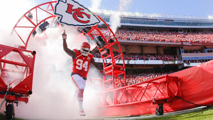 KANSAS CITY, MO – OCTOBER 13: Tyson Jackson #94 of the Kansas City Chiefs runs through the tunnel during player introductions before a game against the Oakland Raiders October 13, 2013 at Arrowhead Stadium in Kansas City, Missouri. (Photo by Kyle Rivas/Getty Images)