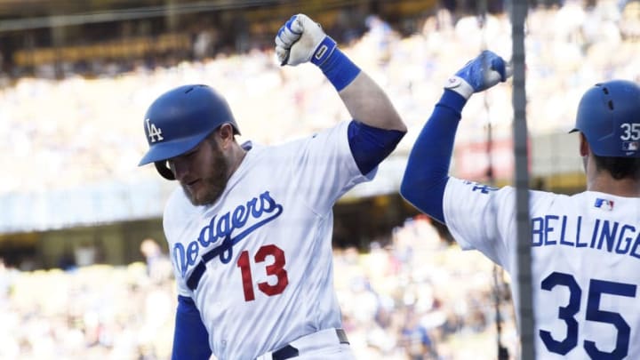 LOS ANGELES, CA - JUNE 09: Max Muncy #13 of the Los Angeles Dodgers celebrates with Cody Bellinger #35 after hitting a home run against pitcher Anibal Sanchez #19 of the Atlanta Braves during the first inning at Dodger Stadium on June 9, 2018 in Los Angeles, California. (Photo by Kevork Djansezian/Getty Images)