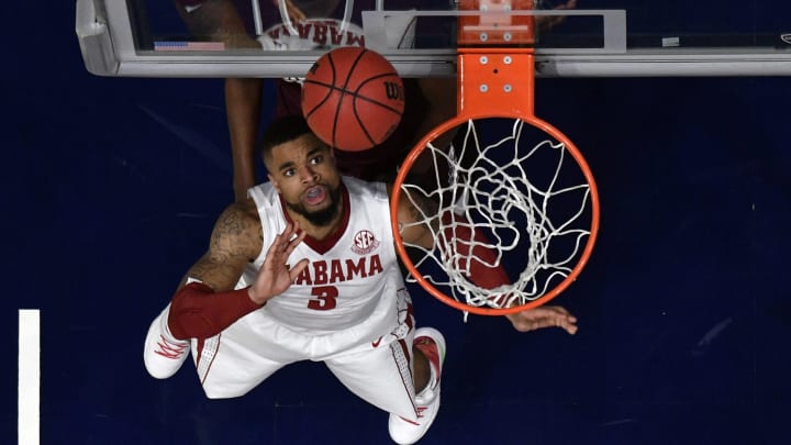 Mar 9, 2017; Nashville, TN, USA; Alabama Crimson Tide guard Corban Collins (3) watches a shot during the second half against the Mississippi State Bulldogs during the SEC Conference Tournament at Bridgestone Arena. Alabama won 75-55. Mandatory Credit: Christopher Hanewinckel-USA TODAY Sports