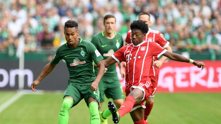 Bayern Munich's Austrian midfielder David Alaba (R) and Bremen's Czech defender Theodor Gebre Selassie vie for the ball during the German First division Bundesliga football match between Werder Bremen and Bayern Munich in Bremen, northern Germany, on August 26, 2017. / AFP PHOTO / PATRIK STOLLARZ / RESTRICTIONS: DURING MATCH TIME: DFL RULES TO LIMIT THE ONLINE USAGE TO 15 PICTURES PER MATCH AND FORBID IMAGE SEQUENCES TO SIMULATE VIDEO. == RESTRICTED TO EDITORIAL USE == FOR FURTHER QUERIES PLEASE CONTACT DFL DIRECTLY AT 49 69 650050 (Photo credit should read PATRIK STOLLARZ/AFP/Getty Images)