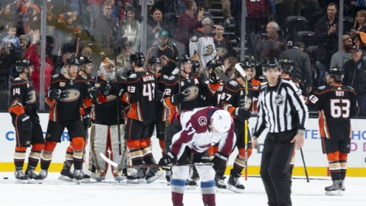 ANAHEIM, CA - MARCH 3: J.T. Compher #37 of the Colorado Avalanche reacts as ;the Anaheim Ducks celebrate after defeating the Colorado Avalanche 2-1 in the game at Honda Center on March 3, 2019 in Anaheim, California. (Photo by Foster Snell/NHLI via Getty Images)