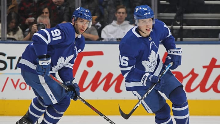 TORONTO, ON - JANUARY 3: John Tavares #91 of the Toronto Maple Leafs brings the puck up ice behind teammate Mitchell Marner #16 during action against the Minnesota Wild in the Next Generation NHL game at Scotiabank Arena on January 3, 2019 in Toronto, Ontario, Canada. The Wild defeated the Maple Leafs 4-3. (Photo by Claus Andersen/Getty Images)