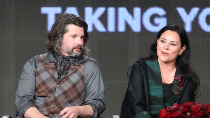 PASADENA, CA - JANUARY 10: Executive Producer Ronald D. Moore and author Diana Gabaldon speak onstage during the 'Outlander' panel discussion at the Starz portion of the 2014 Winter Television Critics Association tour at the Langham Hotel on January 10, 2014 in Pasadena, California. (Photo by Frederick M. Brown/Getty Images)