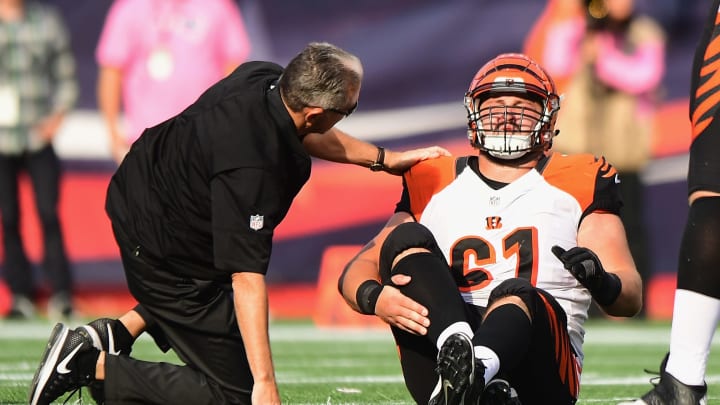FOXBORO, MA – OCTOBER 16: Russell Bodine #61 of the Cincinnati Bengals is injured during the third quarter of a game against the New England Patriots at Gillette Stadium on October 16, 2016 in Foxboro, Massachusetts. (Photo by Billie Weiss/Getty Images)