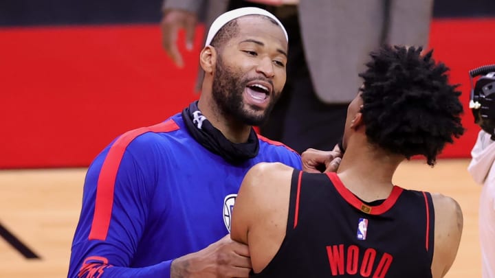 HOUSTON, TEXAS – APRIL 23: DeMarcus Cousins #15 of the Los Angeles Clippers speaks with Christian Wood #35 of the Houston Rockets. (Photo by Carmen Mandato/Getty Images )