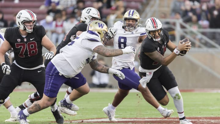 Quarterback Ashton Daniels #13 of the Stanford Cardinal scrambles during a Pac-12 NCAA college football game against the Washington Huskies