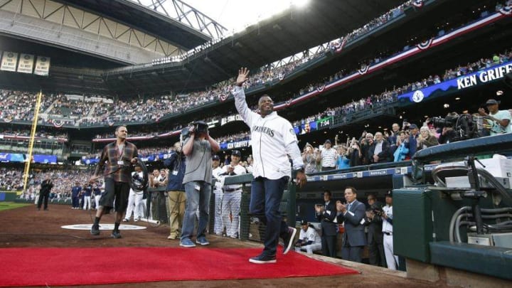 Apr 8, 2016; Seattle, WA, USA; Seattle Mariners former outfielder Ken Griffey, Jr. is introduced during a pre game ceremony honoring his selection to the baseball hall of fame before a game against the Oakland Athletics at Safeco Field. Mandatory Credit: Joe Nicholson-USA TODAY Sports