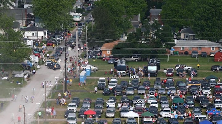 May 29, 2016; Indianapolis, IN, USA; IndyCar Series fans drive through a neighborhood to enter a spectator parking lot prior to the 100th running of the Indianapolis 500 at Indianapolis Motor Speedway. Mandatory Credit: Mark J. Rebilas-USA TODAY Sports