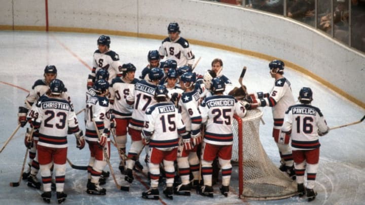 LAKE PLACID, NY - FEBRUARY 22: The United States Hockey team celebrates after they defeated the Soviet Union during a metal round game of the Winter Olympics February 22, 1980 at the Olympic Center in Lake Placid, New York. The game was named "The Miracle On Ice" as the United States defeated the Soviet Union 4-3. . (Photo by Focus on Sport/Getty Images) *** Local Caption ***