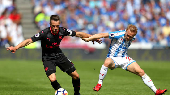 HUDDERSFIELD, ENGLAND - MAY 13: Aaron Ramsey of Arsenal battles for possession with Alex Pritchard of Huddersfield Town during the Premier League match between Huddersfield Town and Arsenal at John Smith's Stadium on May 13, 2018 in Huddersfield, England. (Photo by Catherine Ivill/Getty Images)