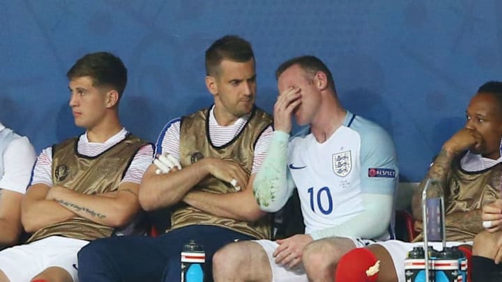 NICE, FRANCE - JUNE 27: Wayne Rooney (2nd R) of England shows his frustration on the bench after being replaced during the UEFA EURO 2016 round of 16 match between England and Iceland at Allianz Riviera Stadium on June 27, 2016 in Nice, France. (Photo by Alex Livesey/Getty Images)