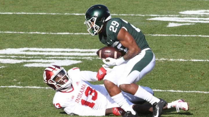 Nov 14, 2020; East Lansing, Michigan, USA; Michigan State Spartans cornerback Shakur Brown (29) intercepts a pass intended for Indiana Hoosiers wide receiver Miles Marshall (13) during the first quarter at Spartan Stadium. Mandatory Credit: Tim Fuller-USA TODAY Sports