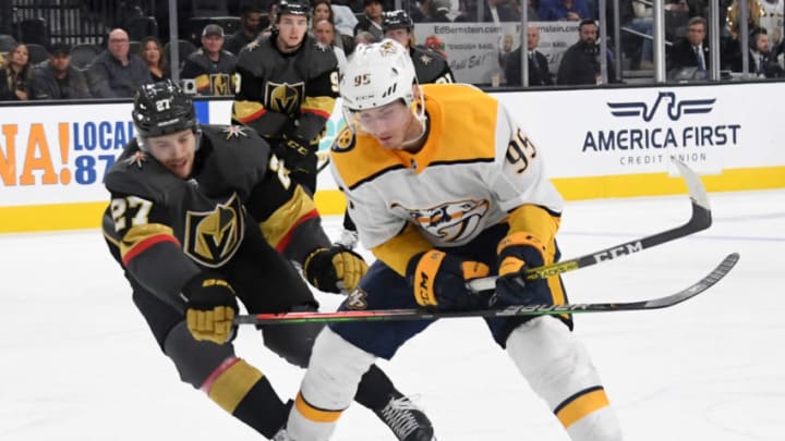 Matt Duchene #95 of the Nashville Predators skates with the puck against Shea Theodore #27 of the Vegas Golden Knights. (Photo by Ethan Miller/Getty Images)