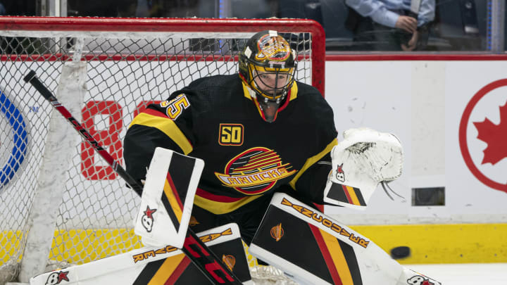 VANCOUVER, BC – NOVEMBER 16: Thatcher Demko #35 of the Vancouver Canucks makes a save during the pre game warm up prior to NHL action against the Colorado Avalanche at Rogers Arena on November 16, 2019 in Vancouver, Canada. (Photo by Rich Lam/Getty Images)