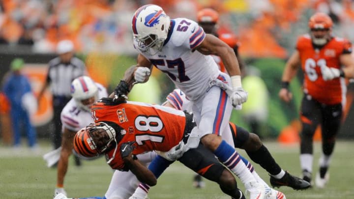 CINCINNATI, OH - OCTOBER 8: Lorenzo Alexander #57 of the Buffalo Bills knocks down A.J. Green #18 of the Cincinnati Bengals during the third quarter at Paul Brown Stadium on October 8, 2017 in Cincinnati, Ohio. (Photo by Michael Reaves/Getty Images)