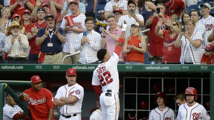 WASHINGTON, DC - MAY 21: Juan Soto #22 of the Washington Nationals acknowledges the crowd after hitting a home run in the second inning for his first career Major League hit against the San Diego Padres at Nationals Park on May 21, 2018 in Washington, DC. (Photo by Greg Fiume/Getty Images)
