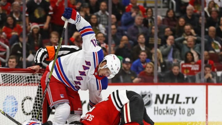 CHICAGO, IL - OCTOBER 25: Members of the Chicago Blackhawks including Brent Seabrook #7 get piled up in front of the net with members if the New York Rangers including Brett Howden #21 and Henrik Lundqvist #30 at the United Center on October 25, 2018 in Chicago, Illinois. The Blackhawks defeated the Rangers 4-1. (Photo by Jonathan Daniel/Getty Images)
