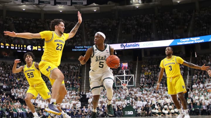 EAST LANSING, MICHIGAN – JANUARY 05: Cassius Winston #5 of the Michigan State Spartans drives to the basket against Brandon Johns Jr. #23 of the Michigan Wolverines (Photo by Gregory Shamus/Getty Images)