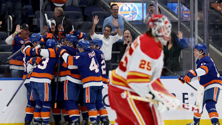 Nov 7, 2022; Elmont, New York, USA; Calgary Flames goaltender Jacob Markstrom (25) skates off the ice after losing to the New York Islanders during overtime at UBS Arena. Mandatory Credit: Brad Penner-USA TODAY Sports