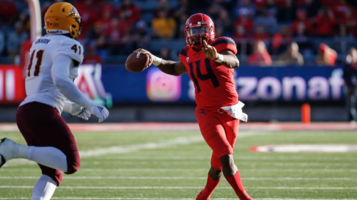 TUCSON, AZ - NOVEMBER 24: Arizona Wildcats quarterback Khalil Tate (14) throws a pass during the college football game between the Arizona State Sun Devils and the Arizona Wildcats on November 24, 2018 at Arizona Stadium in Tucson, Arizona (Photo by Kevin Abele/Icon Sportswire via Getty Images)