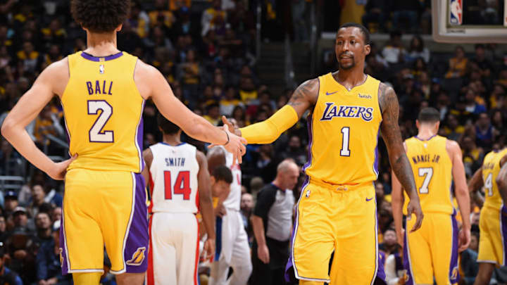 LOS ANGELES, CA - OCTOBER 31: Lonzo Ball #2 and Kentavious Caldwell-Pope #1 of the Los Angeles Lakers high five during the game against the Detroit Pistons on October 31, 2017 at STAPLES Center in Los Angeles, California. NOTE TO USER: User expressly acknowledges and agrees that, by downloading and/or using this Photograph, user is consenting to the terms and conditions of the Getty Images License Agreement. Mandatory Copyright Notice: Copyright 2017 NBAE (Photo by Adam Pantozzi/NBAE via Getty Images)