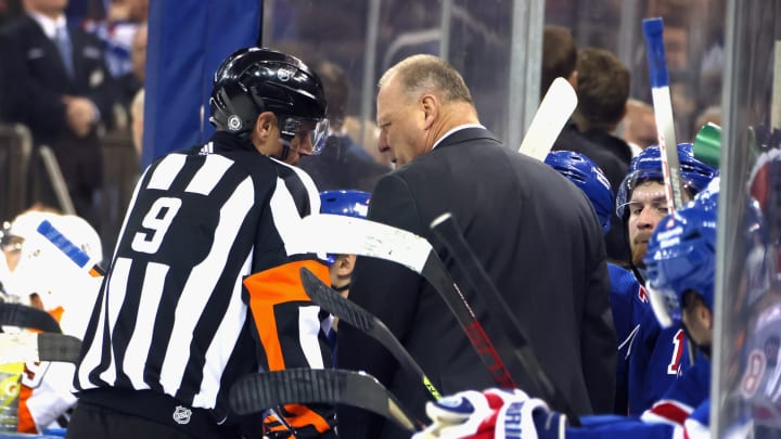 NEW YORK, NEW YORK – APRIL 03: New York Rangers head coach Gerard Gallant talks to referee Dan O’Rourke #9 during the third period against the Philadelphia Flyers at Madison Square Garden on April 03, 2022 in New York City. (Photo by Bruce Bennett/Getty Images)