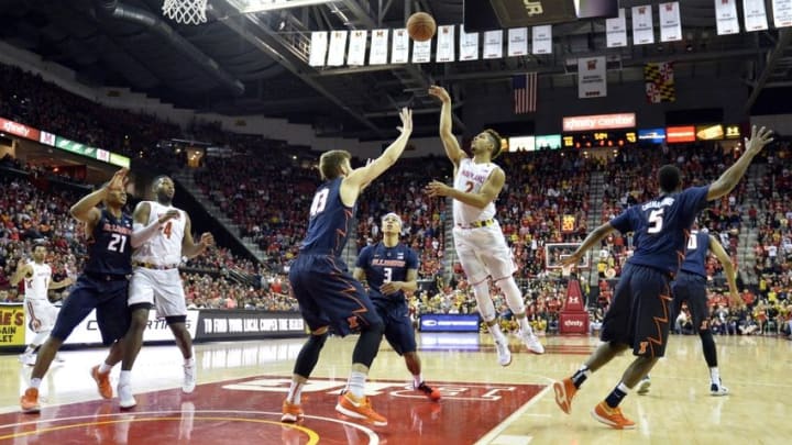 Mar 3, 2016; College Park, MD, USA; Maryland Terrapins guard Melo Trimble (2) shoots over Illinois Fighting Illini forward Michael Finke (43) during the second half at Xfinity Center. Maryland Terrapins defeated Illinois Fighting Illini 81-55. Mandatory Credit: Tommy Gilligan-USA TODAY Sports