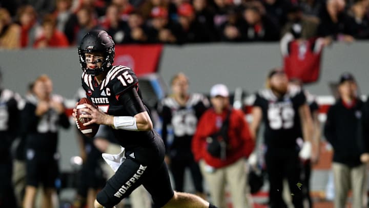 RALEIGH, NORTH CAROLINA – NOVEMBER 08: Ryan Finley #15 of the North Carolina State Wolfpack rolls out against the Wake Forest Demon Deacons during the first half of their game at Carter-Finley Stadium on November 08, 2018 in Raleigh, North Carolina. (Photo by Grant Halverson/Getty Images)