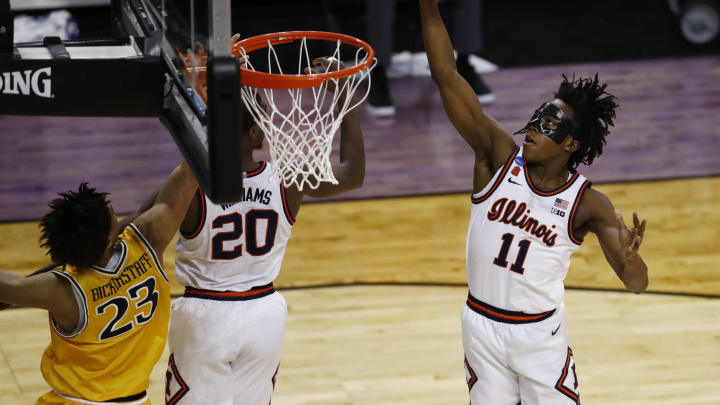 Mar 19, 2021; Indianapolis, Indiana, USA; Illinois Fighting Illini guard Ayo Dosunmu (11) grabs a rebound against the Drexel Dragons during the first round of the 2021 NCAA Tournament at Indiana Farmers Coliseum. Mandatory Credit: Aaron Doster-USA TODAY Sports