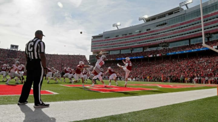 Ohio State Buckeyes wide receiver Marvin Harrison Jr. (18) attempts to block a punt by Nebraska Cornhuskers punter William Przystup (90) during Saturday's NCAA Division I football game at Memorial Stadium in Lincoln, Neb., on November 6, 2021.Osu21neb Bjp 1061