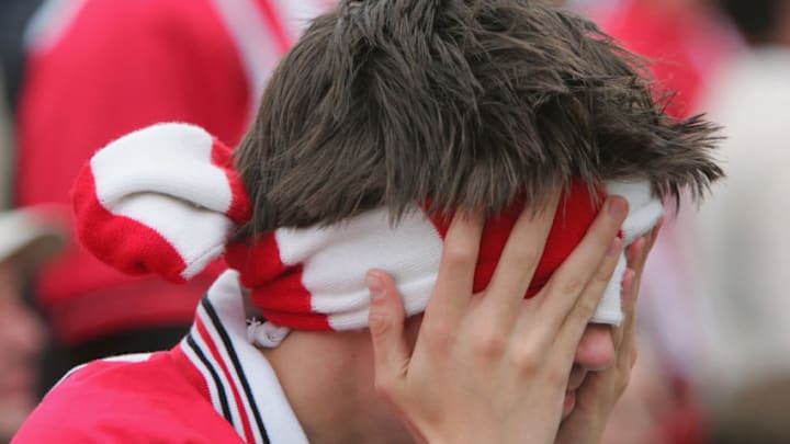 SOUTHAMPTON, ENGLAND – APRIL 24: A distraught Southampton fan at the end of the Barclays Premiership match between Portsmouth and Southampton at Fratton Park on April 24, 2005 in Portsmouth, England. (Photo by Mike Hewitt/Getty Images)