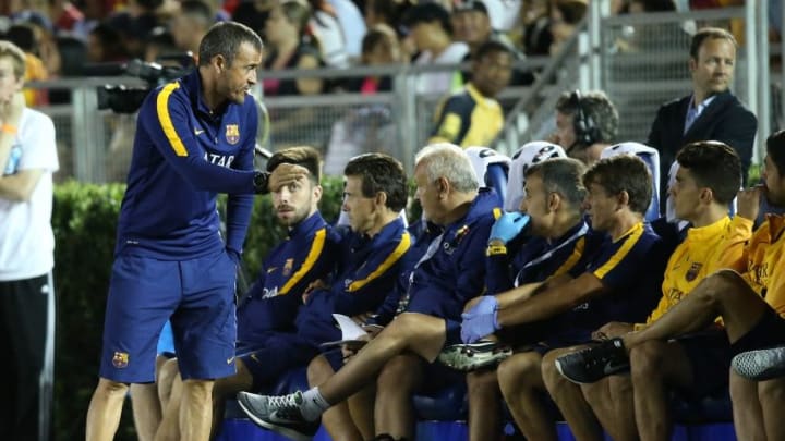 July 21, 2015; Los Angeles, CA, USA; Barcelona head coach Luis Enrique speaks to bench players as they watch game action against Los Angeles Galaxy during the second half at Rose Bowl. Mandatory Credit: Gary A. Vasquez-USA TODAY Sports