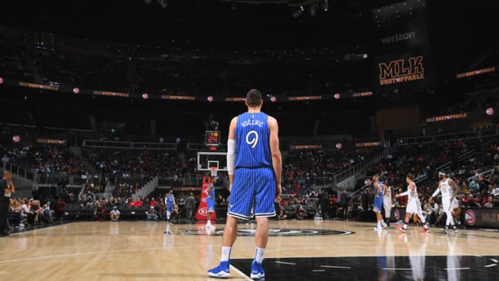ATLANTA, GA - JANUARY 21: Nikola Vucevic #9 of the Orlando Magic looks on during the game against the Atlanta Hawks on January 21, 2019 at State Farm Arena in Atlanta, Georgia. NOTE TO USER: User expressly acknowledges and agrees that, by downloading and/or using this photograph, user is consenting to the terms and conditions of the Getty Images License Agreement. Mandatory Copyright Notice: Copyright 2019 NBAE (Photo by Garrett Ellwood/NBAE via Getty Images)