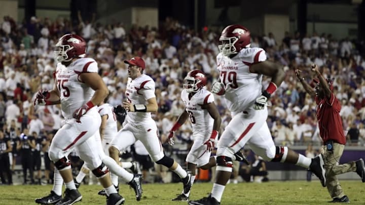 Sep 10, 2016; Fort Worth, TX, USA; Arkansas Razorbacks players celebrate the victory in double overtime against the TCU Horned Frogs at Amon G. Carter Stadium. Mandatory Credit: Kevin Jairaj-USA TODAY Sports