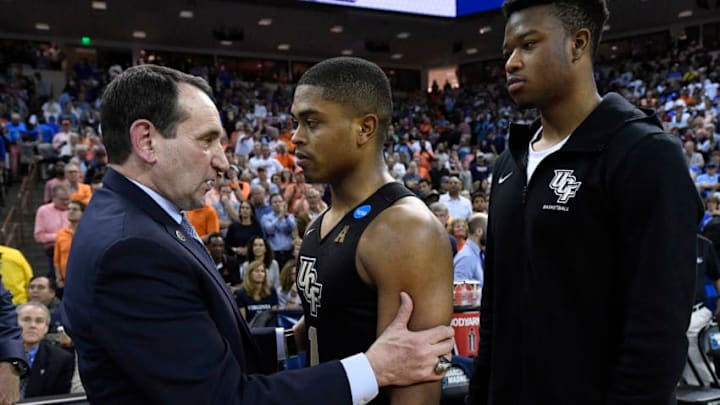 COLUMBIA, SC - MARCH 24: Head coach Mike Krzyzewski of the Duke Blue Devils talks to B.J. Taylor #1 of the UCF Knights after the second round of the 2019 NCAA Men's Basketball Tournament held at Colonial Life Arena on March 24, 2019 in Columbia, South Carolina. (Photo by Grant Halverson/NCAA Photos via Getty Images)