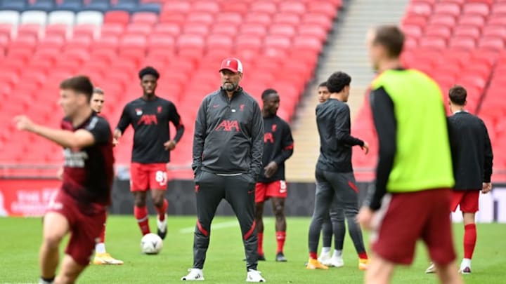 Liverpool's German manager Jurgen Klopp (C) looks on during the warm up ahead of the English FA Community Shield football match between Arsenal and Liverpool at Wembley Stadium in north London on August 29, 2020. (Photo by JUSTIN TALLIS / POOL / AFP) / NOT FOR MARKETING OR ADVERTISING USE / RESTRICTED TO EDITORIAL USE (Photo by JUSTIN TALLIS/POOL/AFP via Getty Images)