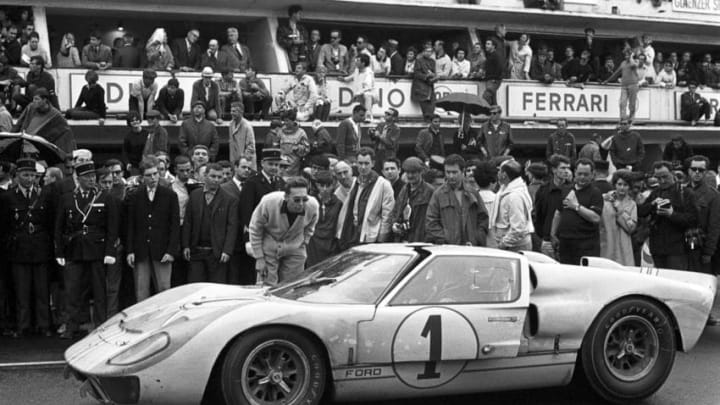 Ken Miles, Denny Hulme, Ford MkII, 24 Hours of Le Mans, Le Mans, 19 June 1966. Denny Hulme and teammate Ken Miles at the finish of the 1966 24 Hours of Le Mans where they finished second driving the Ford MkII. (Photo by Bernard Cahier/Getty Images)