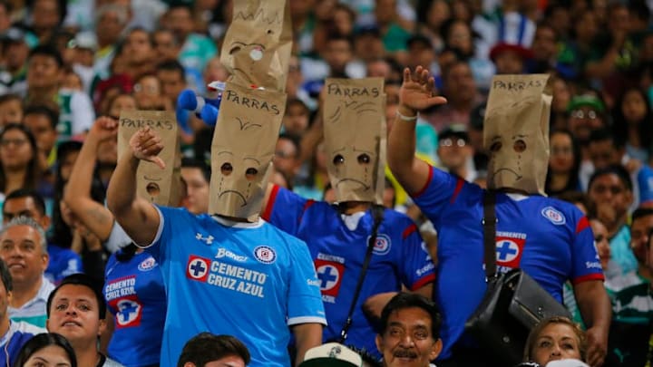 TORREON, MEXICO - FEBRUARY 25: Fans of Cruz Azul wearing paper bags on their heads look dejected after the 9th round match between Santos Laguna and Cruz Azul as part of Torneo Clausura 2018 Liga MX at Corona Stadium on February 25, 2018 in Torreon, Mexico. (Photo by Natalia Perales/Getty Images)