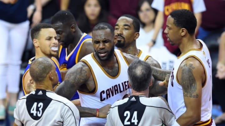 Jun 10, 2016; Cleveland, OH, USA; Cleveland Cavaliers forward LeBron James (23) reacts after a play with Golden State Warriors forward Draymond Green (23) during the fourth quarter in game four of the NBA Finals at Quicken Loans Arena. Mandatory Credit: Bob Donnan-USA TODAY Sports