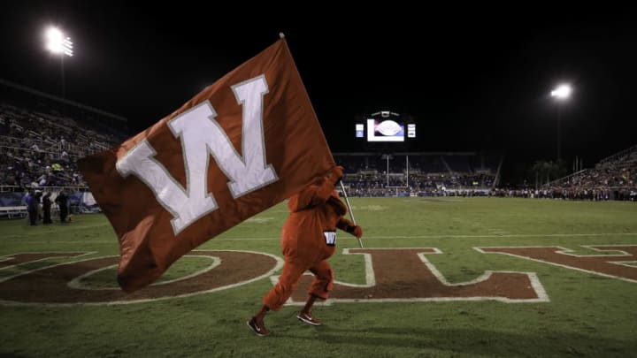 BOCA RATON, FL - DECEMBER 20: The Western Kentucky Hilltoppers mascot Big Red carries a flag during the game against the Memphis Tigers at FAU Stadium on December 20, 2016 in Boca Raton, Florida. (Photo by Rob Foldy/Getty Images)