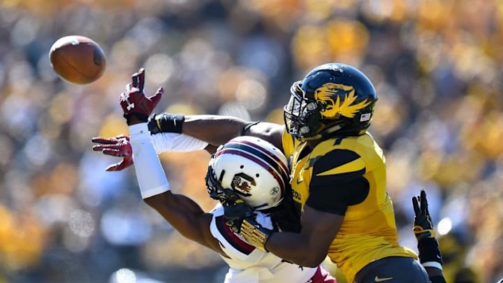 Oct 3, 2015; Columbia, MO, USA; Missouri Tigers defensive back Kenya Dennis (7) breaks up the pass for South Carolina Gamecocks wide receiver Terry Googer (5) during the second half at Faurot Field. The Tigers won 24-10. Mandatory Credit: Jasen Vinlove-USA TODAY Sports